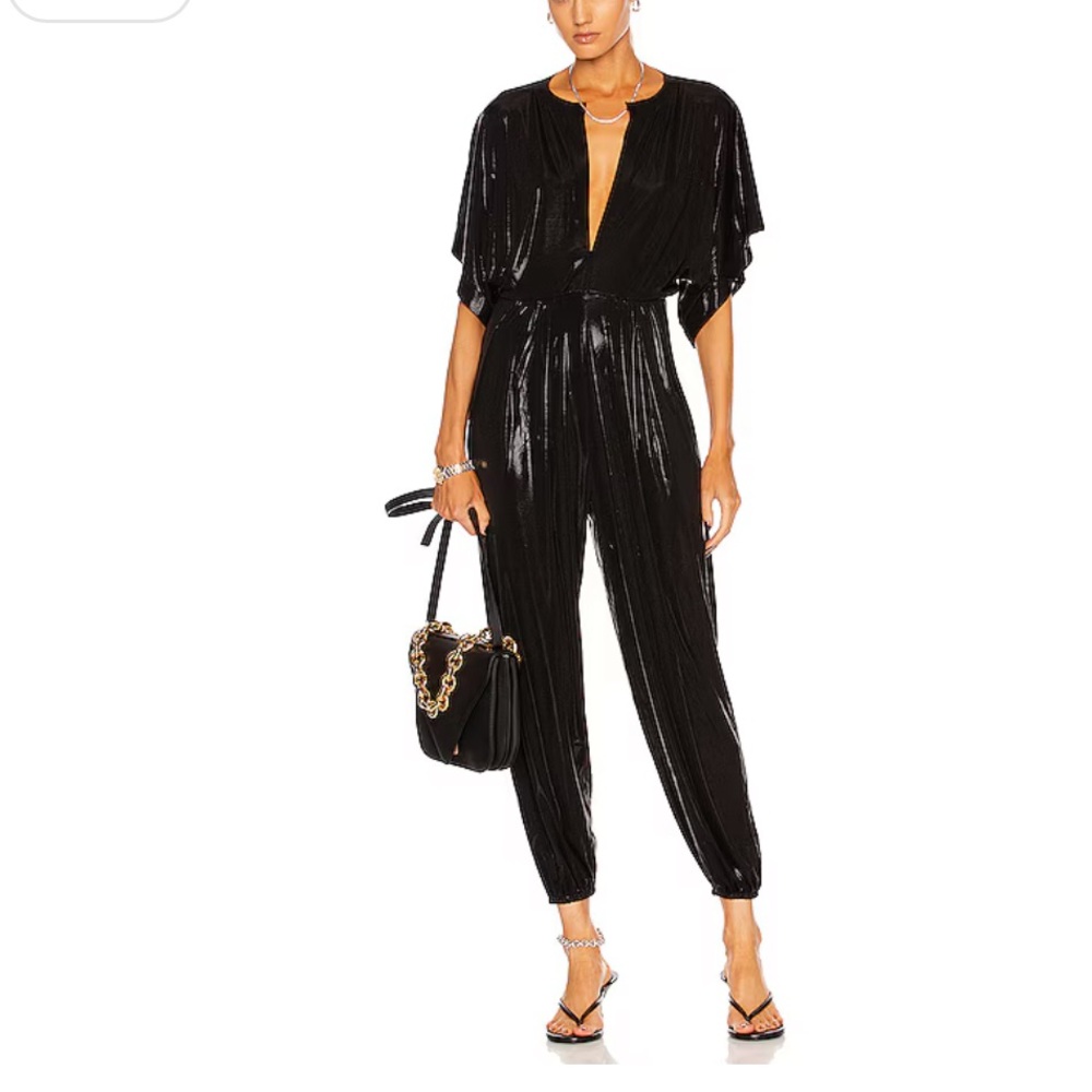 Norma Kamali famous bat wing jumpsuit . NEVER WORN